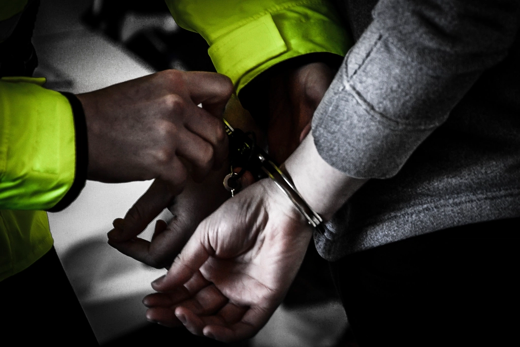 Free police officer arresting young